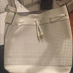 Large white leather hobo bag. Perforated leather